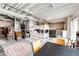 Open basement area with a bunk bed, chairs, table, and exposed ceiling at 17955 Sky Pilot Ave, Parker, CO 80134