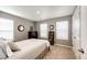 Light-filled bedroom with closet, natural light and neutral carpet at 17955 Sky Pilot Ave, Parker, CO 80134