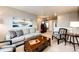 Upstairs living area featuring comfortable furniture, decorations, and natural light at 17955 Sky Pilot Ave, Parker, CO 80134