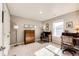 Home office featuring hardwood desks, carpet and natural light at 17955 Sky Pilot Ave, Parker, CO 80134