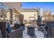 Cozy backyard deck with fire pit and seating at 1365 Mulberry Ln, Highlands Ranch, CO 80129