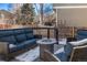 Deck with fire pit and seating area at 1365 Mulberry Ln, Highlands Ranch, CO 80129