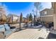 Deck with seating area and snowy ground at 1365 Mulberry Ln, Highlands Ranch, CO 80129