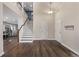 Bright entryway with staircase and hardwood floors at 1365 Mulberry Ln, Highlands Ranch, CO 80129