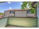 View from a private balcony showing the building's exterior and well-maintained outdoor space at 12023 E Harvard Ave # 203, Aurora, CO 80014