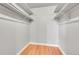 This walk-in closet has laminate floors and painted gray at 12023 E Harvard Ave # 203, Aurora, CO 80014