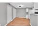 Dining area with wood floors, adjacent to the kitchen, and featuring two large closets at 12023 E Harvard Ave # 203, Aurora, CO 80014