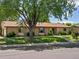 Beautiful ranch-style home with a well-maintained lawn, mature trees, and cozy curb appeal during the day at 3780 W 66Th Ave, Arvada, CO 80003