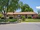 Charming ranch-style home with well-manicured lawn, mature trees, and cozy curb appeal showcased during daytime at 3780 W 66Th Ave, Arvada, CO 80003