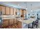 Modern kitchen with an island, granite countertops, stainless steel appliances, and ample cabinet space at 6268 Pike Ct # D, Arvada, CO 80403