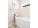 Elegant soaking tub with modern fixtures and minimalist design at 3515 S Ogden St, Englewood, CO 80113
