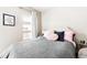 Cozy bedroom with soft lighting, a comfortable bed, and stylish decor at 3515 S Ogden St, Englewood, CO 80113