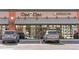 Exterior of a studio salon and sushi restaurant, with reflective glass and parking at 3515 S Ogden St, Englewood, CO 80113