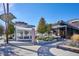Outdoor patio space features a covered dining area and stylish architectural details for a welcoming ambiance at 1804 Grove St, Denver, CO 80204