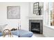 Stylish fireplace with a tile surround, decorative mantel, and modern decor at 5763 N Gibralter Way # 2-108, Aurora, CO 80019