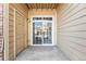 Outdoor patio with a sliding glass door and privacy walls at 5763 N Gibralter Way # 2-108, Aurora, CO 80019