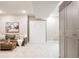 Spacious finished basement with a comfortable seating area, modern decor, and ample storage at 10025 E 63Rd Ave, Denver, CO 80238