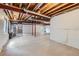 Unfinished basement with exposed beams and ample space for customization at 20861 E 40Th Ave, Denver, CO 80249