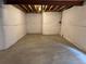 Unfinished basement offering a blank canvas, featuring concrete floors and wrapped walls at 20861 E 40Th Ave, Denver, CO 80249