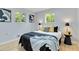 A cozy bedroom with lots of natural light from two windows at 11433 Carlile St, Northglenn, CO 80233