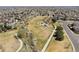 Community aerial view featuring a playground, green space, and walking trail at 871 E 98Th Ave # 1402, Thornton, CO 80229