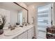 Bathroom with double sinks, marble countertop, and shower at 1173 Williams Loop, Elizabeth, CO 80107