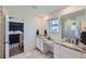 Double vanity bathroom with granite countertops and large shower at 1173 Williams Loop, Elizabeth, CO 80107