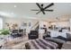 Open concept living and dining area with hardwood floors and kitchen view at 1173 Williams Loop, Elizabeth, CO 80107
