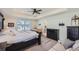 Large main bedroom with ensuite bathroom and ample closet space at 1173 Williams Loop, Elizabeth, CO 80107