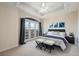 Cozy bedroom with a walk-out balcony, decorative ceiling, and dark wood accents at 1827 N Grant St # 1104, Denver, CO 80203