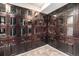 Interior of wine cellar featuring wooden storage with glass doors for viewing wine collection at 1827 N Grant St # 1104, Denver, CO 80203