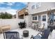 Private backyard featuring a grill, seating, and a small patio at 9661 W Chatfield Ave # B, Littleton, CO 80128