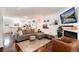 Open-concept living space flows into the kitchen and features a cozy seating area with stylish decor at 9661 W Chatfield Ave # B, Littleton, CO 80128