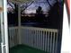 Private balcony offers a peaceful outdoor retreat at twilight at 1300 S Parker Rd # 212, Denver, CO 80231