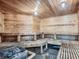 Large sauna with wood benches and wood paneling provides a relaxing, spa-like experience at 1300 S Parker Rd # 212, Denver, CO 80231