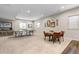 Spacious basement featuring a ping pong table, card table, and carpet flooring at 4145 Manorbrier Cir, Castle Rock, CO 80104