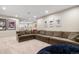 Comfortable basement with a large sectional sofa and plenty of room to relax at 4145 Manorbrier Cir, Castle Rock, CO 80104