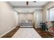 Versatile bedroom includes hardwood floors and an overhead fan at 4145 Manorbrier Cir, Castle Rock, CO 80104