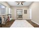 Versatile bedroom includes hardwood floors, fan, and an entry to the basement at 4145 Manorbrier Cir, Castle Rock, CO 80104
