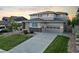 Beautiful two-story home with a well-manicured lawn, charming curb appeal, and a two car garage at 4145 Manorbrier Cir, Castle Rock, CO 80104