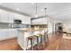 Kitchen with granite counters, a breakfast bar, and stainless steel appliances at 4145 Manorbrier Cir, Castle Rock, CO 80104