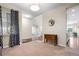 Open-concept living room with large windows, and hardwood floors at 4145 Manorbrier Cir, Castle Rock, CO 80104
