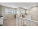 Loft area with natural light, neutral paint, and views of the neighborhood at 4145 Manorbrier Cir, Castle Rock, CO 80104