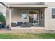 Cozy patio with comfortable furniture and view of the backyard at 4145 Manorbrier Cir, Castle Rock, CO 80104
