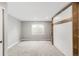 Bright bedroom featuring recessed lights, neutral paint, and a large window offering natural light at 6858 Zenobia St # 9, Westminster, CO 80030