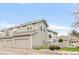 Two-story home with a two-car garage, well-maintained lawn, and neutral exterior at 6858 Zenobia St # 9, Westminster, CO 80030