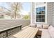 A furnished outdoor patio space including a table, seating, and view of the neighborhood at 6858 Zenobia St # 9, Westminster, CO 80030