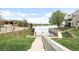 Waterfront access with stairs to dock, railing and community lawn at 6858 Zenobia St # 9, Westminster, CO 80030