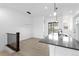 Bright dining area with modern lighting and access to kitchen island at 14281 Currant St, Broomfield, CO 80020