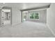 Spacious basement with neutral carpeting, a sliding glass door, and ample natural light at 1795 Eldorado Cir, Superior, CO 80027